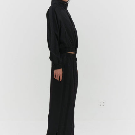 LEISEU TRACK PANTS IN BLACK