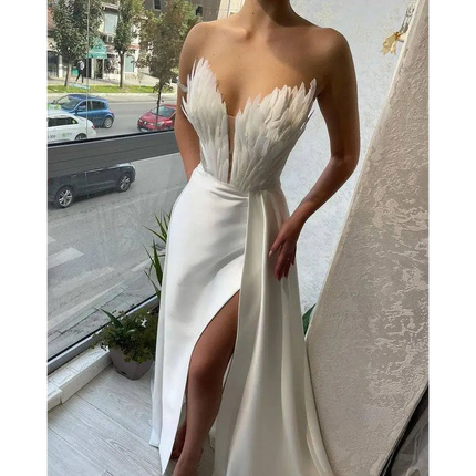 White Satin Gown with Feathers Sweeping the Floor