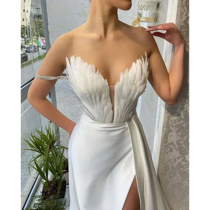 White Satin Gown with Feathers Sweeping the Floor