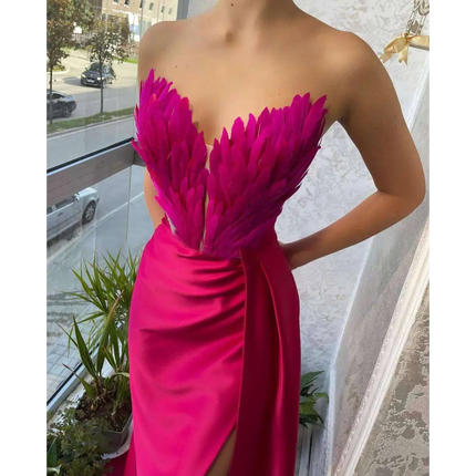 White Satin Gown with Feathers Sweeping the Floor